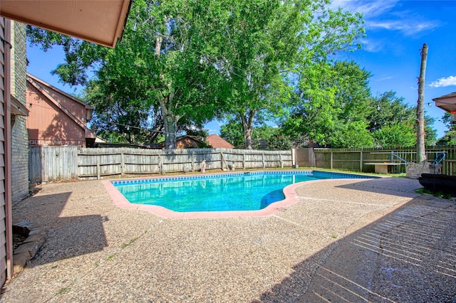 15623 Ensenada Dr, Houston, TX 77083 - view of pool featuring a patio area and a fenced backyard