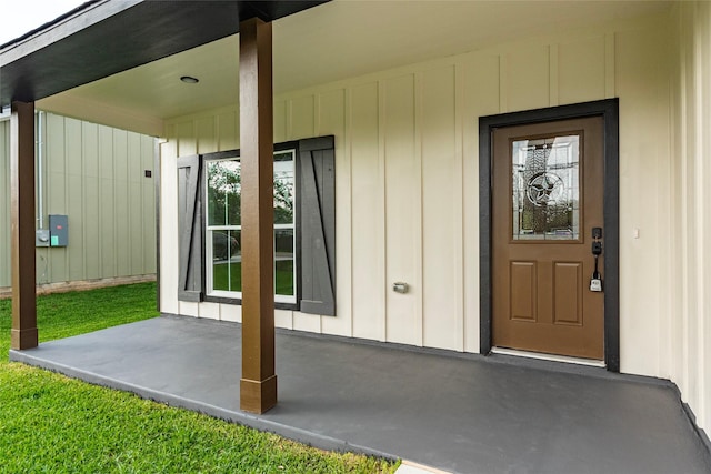 14606 W 6th St, Santa Fe, TX 77517 - property entrance with board and batten siding and covered porch