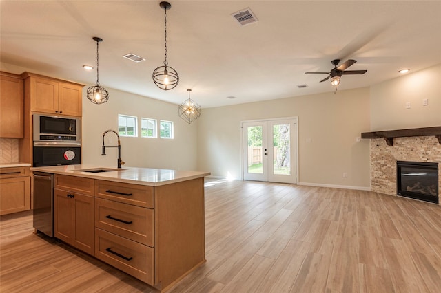 14606 W 6th St, Santa Fe, TX 77517 - kitchen featuring a sink, open floor plan, appliances with stainless steel finishes, plenty of natural light, and recessed lighting
