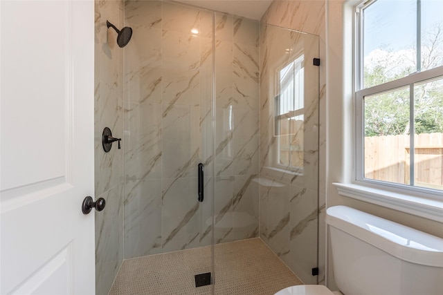 14606 W 6th St, Santa Fe, TX 77517 - bathroom featuring toilet, a marble finish shower, and plenty of natural light
