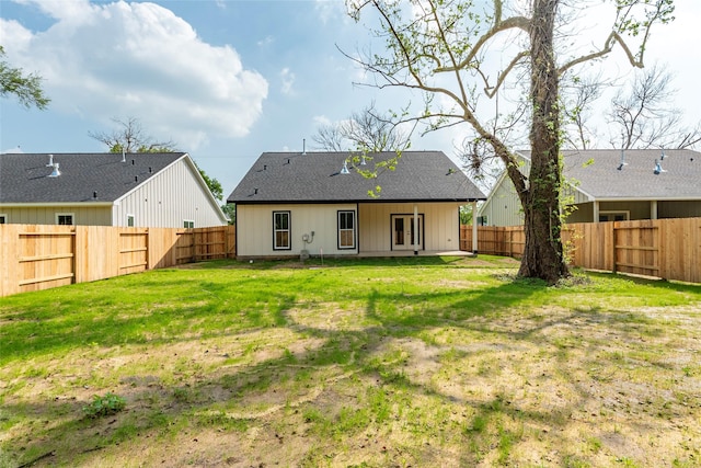 14606 W 6th St, Santa Fe, TX 77517 - back of house featuring a shingled roof