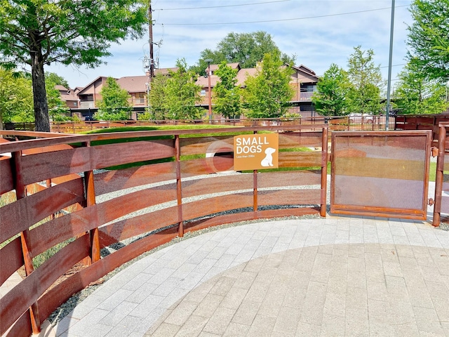 3130 Walnut Bend Ln Unit 409, Houston, TX 77042 - gate with fence and a residential view