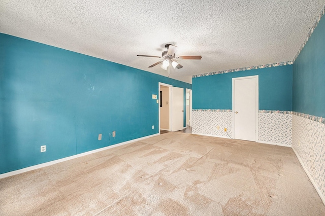 3823 Fernglade Dr, Houston, TX 77068 - carpeted empty room with ceiling fan and a textured ceiling