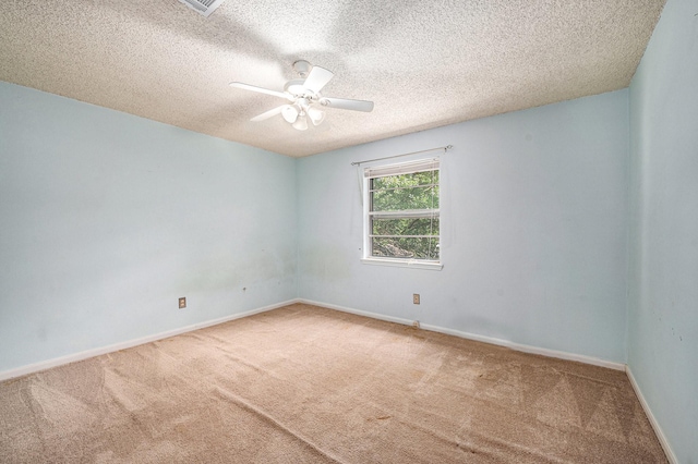 3823 Fernglade Dr, Houston, TX 77068 - unfurnished room with carpet floors, ceiling fan, a textured ceiling, and baseboards
