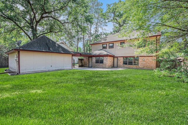 3823 Fernglade Dr, Houston, TX 77068 - rear view of property featuring a patio area and a chimney