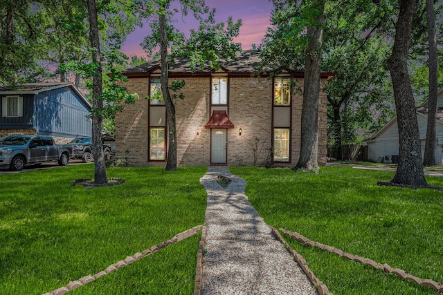 3823 Fernglade Dr, Houston, TX 77068 - view of front of home with a front lawn and brick siding