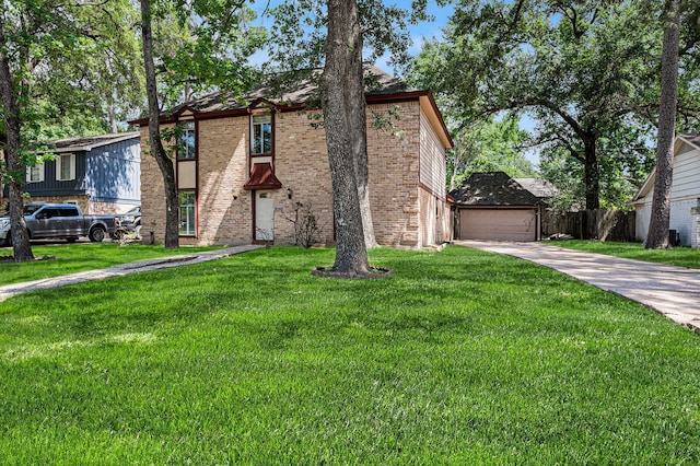 3823 Fernglade Dr, Houston, TX 77068 - tudor house with concrete driveway, brick siding, and a garage