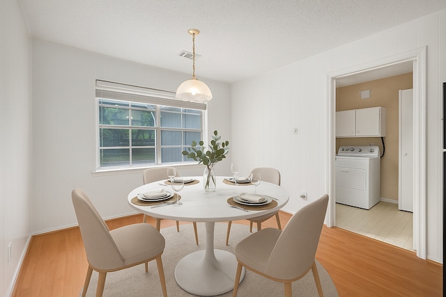 3823 Fernglade Dr, Houston, TX 77068 - dining space featuring washer / dryer and light wood finished floors