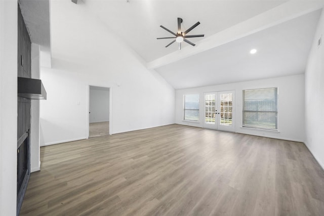 2644 Hadley Cir, Sugar Land, TX 77478 - unfurnished living room with a fireplace, ceiling fan, wood finished floors, and high vaulted ceiling