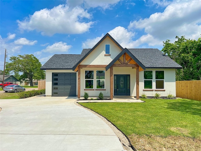 16803 Forest Trail Dr, Channelview, TX 77530 - view of front of house with concrete driveway, stucco siding, an attached garage, and a shingled roof