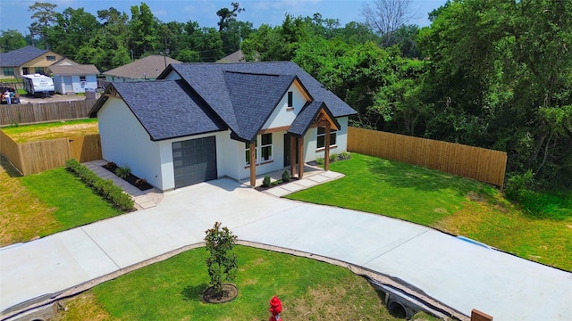 16803 Forest Trail Dr, Channelview, TX 77530 - view of front of property featuring stucco siding, an attached garage, concrete driveway, and a shingled roof