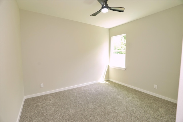 16803 Forest Trail Dr, Channelview, TX 77530 - empty room featuring carpet flooring, a ceiling fan, and baseboards