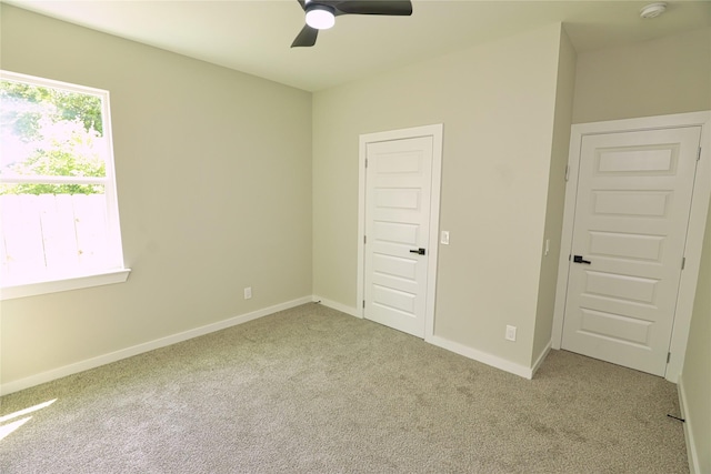 16803 Forest Trail Dr, Channelview, TX 77530 - unfurnished bedroom featuring carpet flooring, baseboards, and a ceiling fan