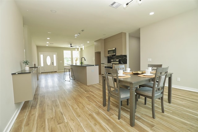 16803 Forest Trail Dr, Channelview, TX 77530 - dining space with light wood-type flooring, baseboards, and recessed lighting