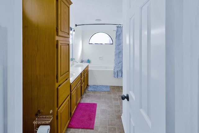 3100 75th St Unit 5, Galveston, TX 77551 - bathroom with shower / tub combo with curtain, vanity, and tile patterned floors