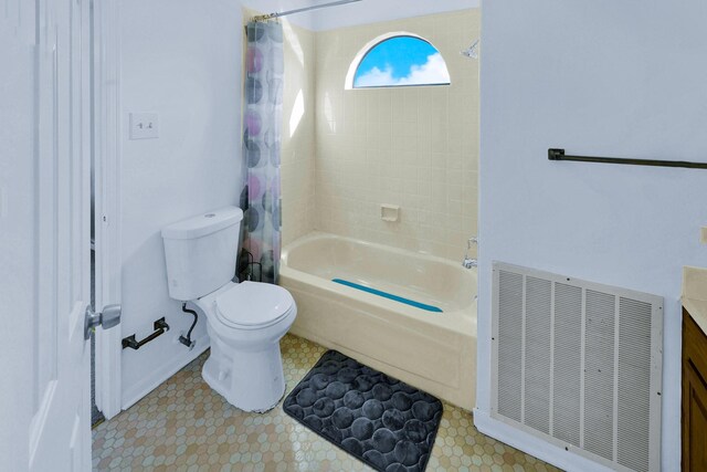 3100 75th St Unit 5, Galveston, TX 77551 - bathroom with toilet, shower / bath combo with shower curtain, and vanity