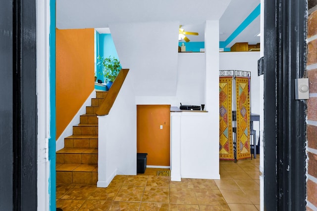3100 75th St Unit 5, Galveston, TX 77551 - stairs with tile patterned floors and ceiling fan