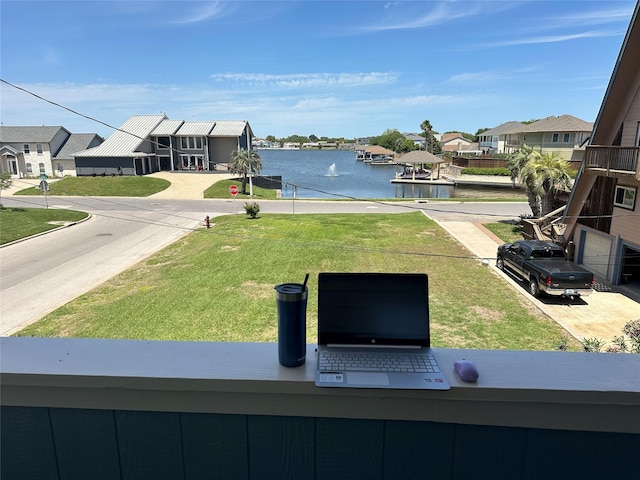 3100 75th St Unit 5, Galveston, TX 77551 - view of yard featuring a water view and a residential view