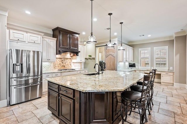 2919 Rutherford Place Ct, Katy, TX 77494 - kitchen with appliances with stainless steel finishes, a sink, stone tile flooring, baseboards, and decorative backsplash
