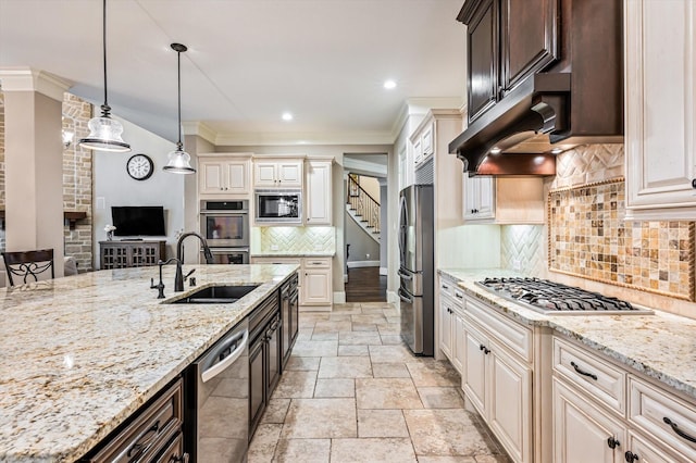 2919 Rutherford Place Ct, Katy, TX 77494 - kitchen with a sink, stainless steel appliances, stone tile floors, light stone countertops, and recessed lighting