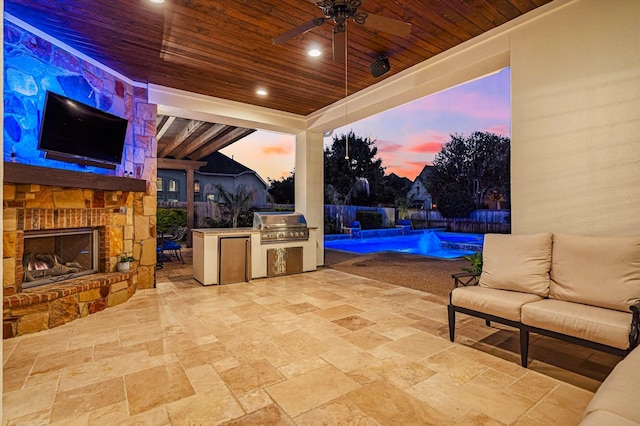 2919 Rutherford Place Ct, Katy, TX 77494 - fenced backyard featuring an outdoor brick fireplace, a patio area, and ceiling fan