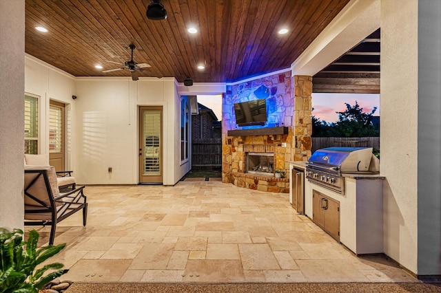2919 Rutherford Place Ct, Katy, TX 77494 - view of patio with ceiling fan and an outdoor stone fireplace