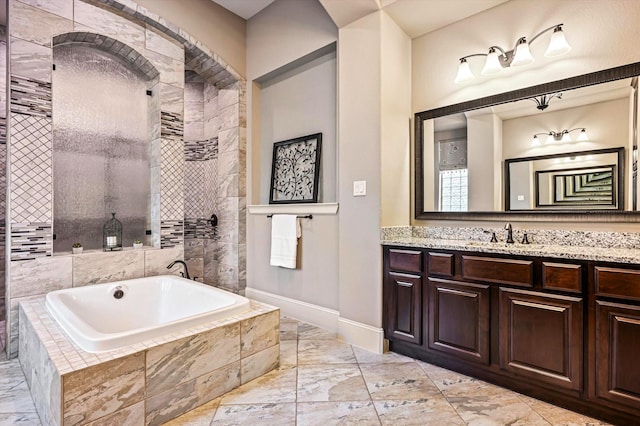 2919 Rutherford Place Ct, Katy, TX 77494 - full bath with a garden tub, marble finish floors, baseboards, vanity, and tiled shower