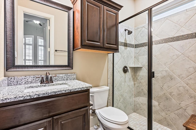 2919 Rutherford Place Ct, Katy, TX 77494 - bathroom featuring a stall shower, toilet, and vanity