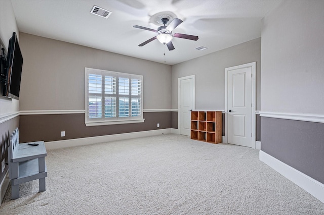 2919 Rutherford Place Ct, Katy, TX 77494 - unfurnished living room featuring a ceiling fan, carpet, and baseboards