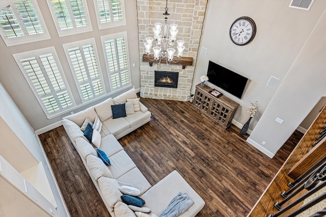 2919 Rutherford Place Ct, Katy, TX 77494 - living room with a high ceiling, a chandelier, plenty of natural light, wood finished floors, and baseboards