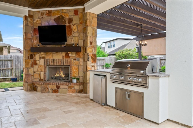 2919 Rutherford Place Ct, Katy, TX 77494 - view of patio / terrace with an outdoor stone fireplace and a pergola