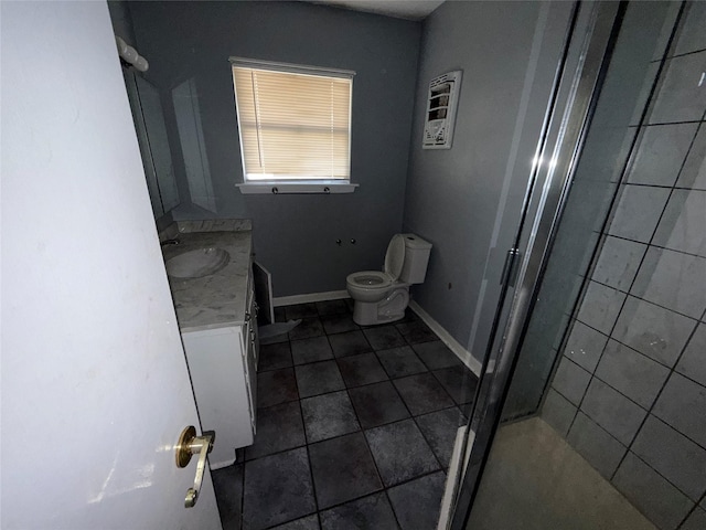 1307 Olive St, Baytown, TX 77520 - full bath with toilet, vanity, tile patterned flooring, and a stall shower