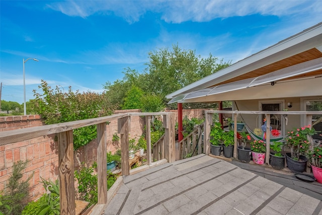 2902 Back Bay Brook Trl, Houston, TX 77045 - wooden deck featuring a patio area and fence