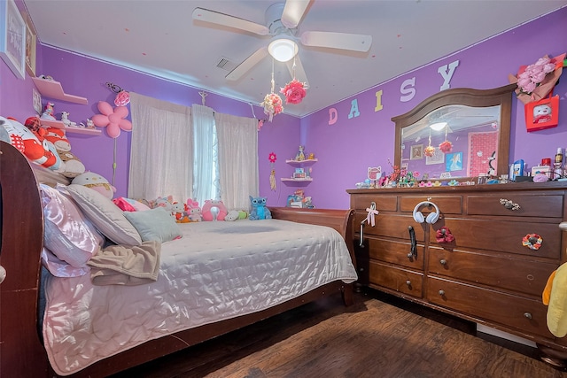 2902 Back Bay Brook Trl, Houston, TX 77045 - bedroom featuring wood finished floors and a ceiling fan
