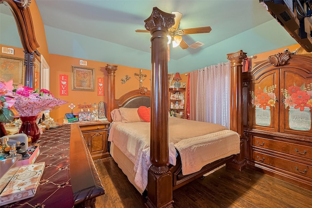 2902 Back Bay Brook Trl, Houston, TX 77045 - bedroom with dark wood finished floors, vaulted ceiling, decorative columns, and a ceiling fan