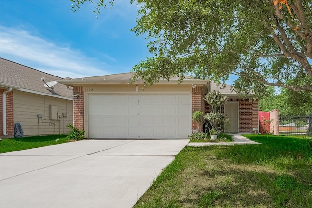 2902 Back Bay Brook Trl, Houston, TX 77045 - view of front facade with brick siding, an attached garage, driveway, and fence