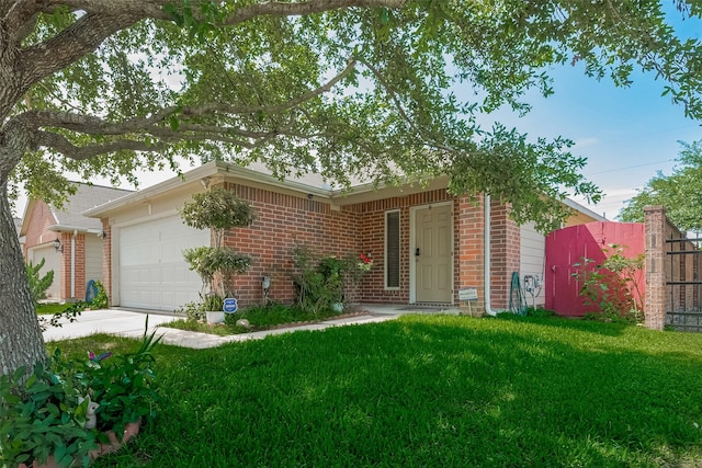 2902 Back Bay Brook Trl, Houston, TX 77045 - view of front of property featuring an attached garage, brick siding, and concrete driveway