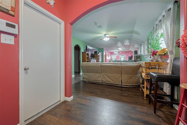 2902 Back Bay Brook Trl, Houston, TX 77045 - living area with arched walkways, ceiling fan, and wood finished floors