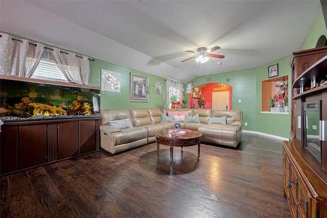 2902 Back Bay Brook Trl, Houston, TX 77045 - living area featuring dark wood finished floors, a ceiling fan, vaulted ceiling, and baseboards