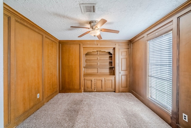 15714 Pebble Bend Dr, Houston, TX 77068 - carpeted empty room with ceiling fan and a textured ceiling