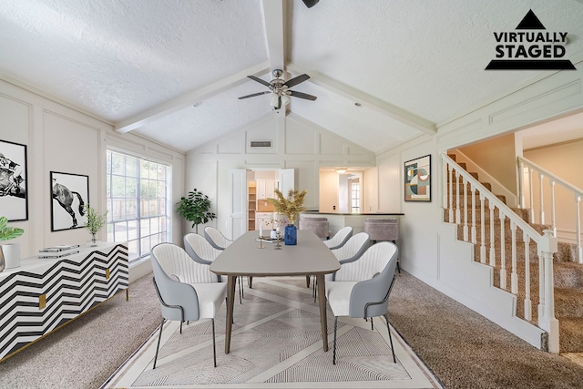 15714 Pebble Bend Dr, Houston, TX 77068 - dining room with carpet flooring, a textured ceiling, stairs, ceiling fan, and a decorative wall