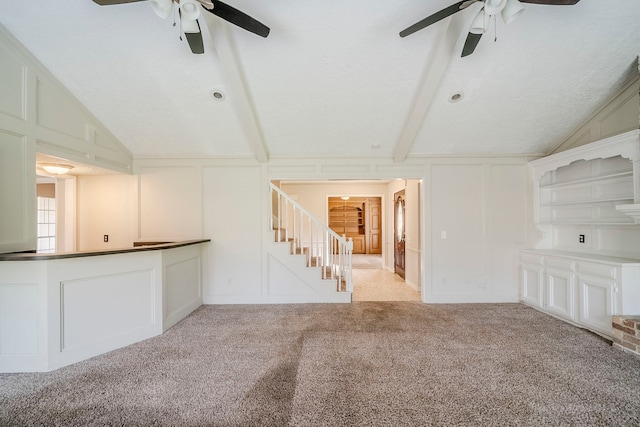15714 Pebble Bend Dr, Houston, TX 77068 - unfurnished living room featuring a ceiling fan, a decorative wall, stairway, and light carpet