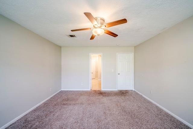 15714 Pebble Bend Dr, Houston, TX 77068 - carpeted empty room featuring a ceiling fan and baseboards