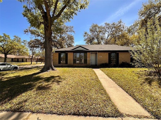 738 Beachcomber Ln, Houston, TX 77062 - view of front of home with a front yard and brick siding