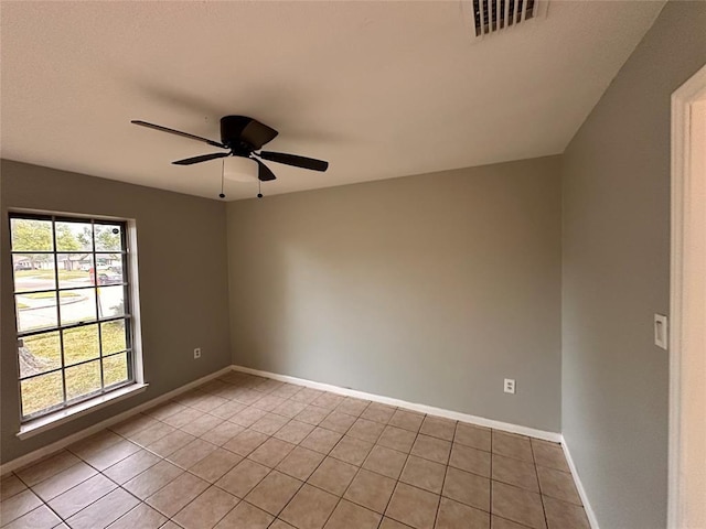 738 Beachcomber Ln, Houston, TX 77062 - unfurnished room featuring a ceiling fan, light tile patterned flooring, and baseboards