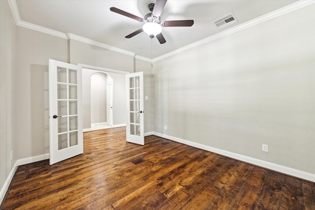 27208 Adrian Hills Ln, Spring, TX 77386 - empty room with french doors, arched walkways, ornamental molding, baseboards, and wood finished floors