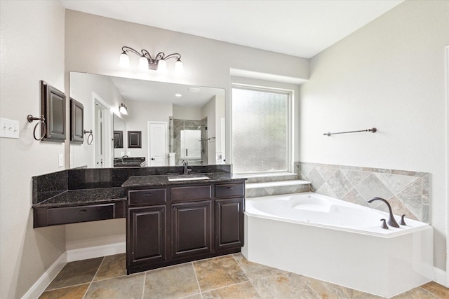 27208 Adrian Hills Ln, Spring, TX 77386 - bathroom featuring a shower stall, a bath, and vanity