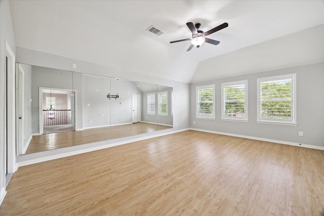 27208 Adrian Hills Ln, Spring, TX 77386 - unfurnished living room with a ceiling fan, baseboards, light wood-style flooring, and vaulted ceiling