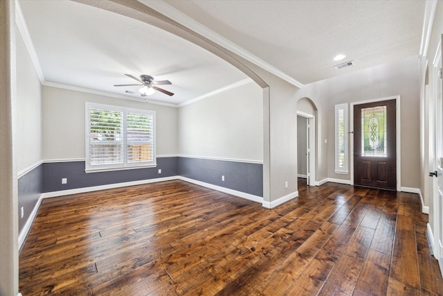 27208 Adrian Hills Ln, Spring, TX 77386 - entrance foyer featuring dark wood-type flooring, a ceiling fan, baseboards, crown molding, and arched walkways