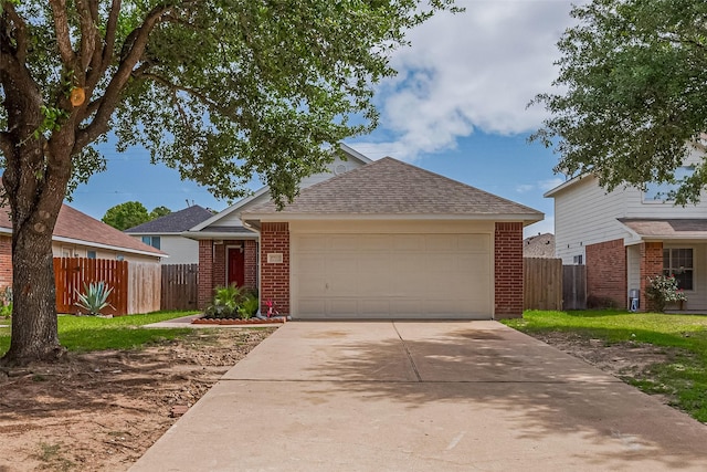 2706 Star Peak Dr, Houston, TX 77088 - view of front of home with brick siding, roof with shingles, and fence